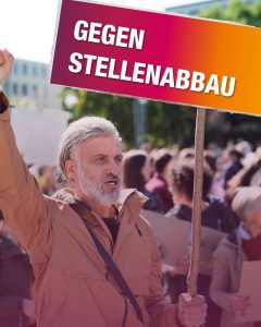 demonstrant gegen stellenabbau